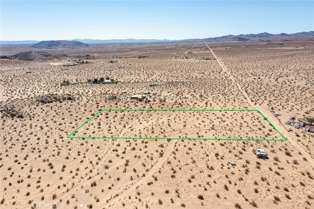 5900 Kickapoo Trail Landers, CA 92285 - Photo 14 of 14 a view of an ocean beach and mountain