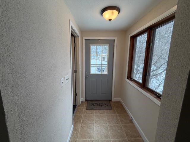 824 12th Street North Virginia, MN 55792 - Photo 12 of 34 Doorway with a textured wall
