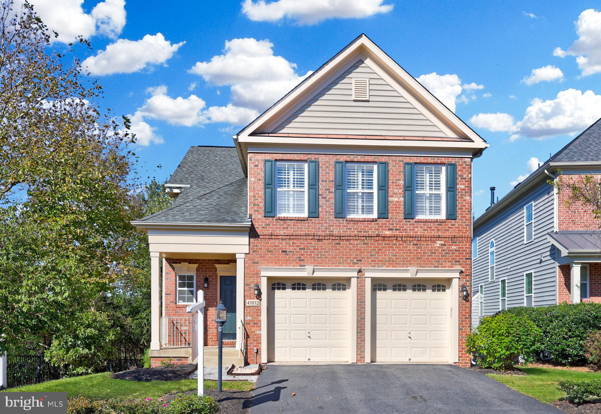43032 La Riva Drive Ashburn, VA 20148 - Photo 1 of 1 a view of a house with yard and plants