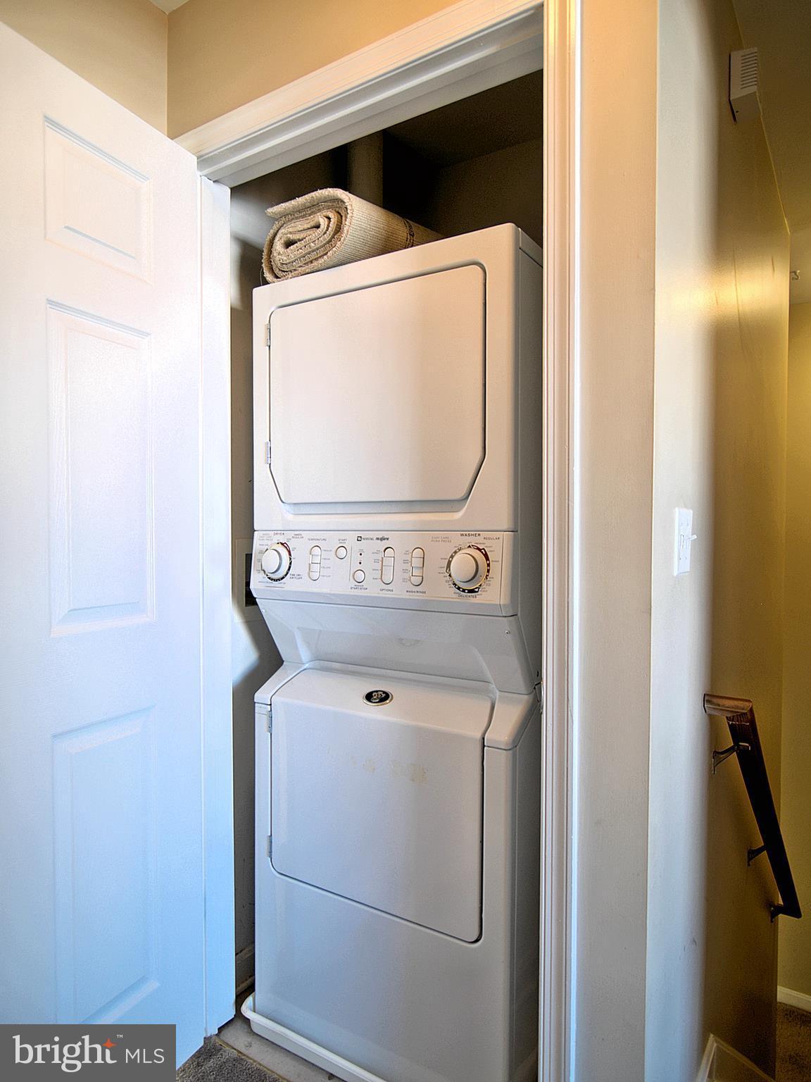 6827 4th Street Northwest, Unit 304 Washington, DC 20012 - Photo 17 of 23 a utility room with dryer and washer