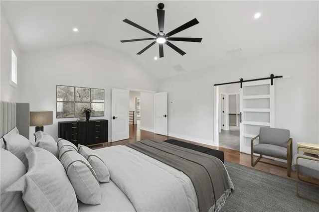 a bathroom with a tub sink a toilet and a shower