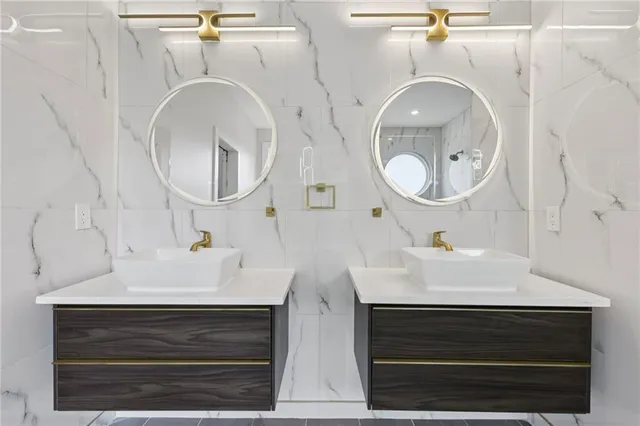 a spacious bathroom with a toilet a sink and a bathtub