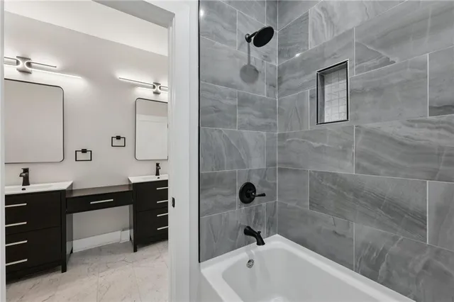 a bathroom with a sink and a window