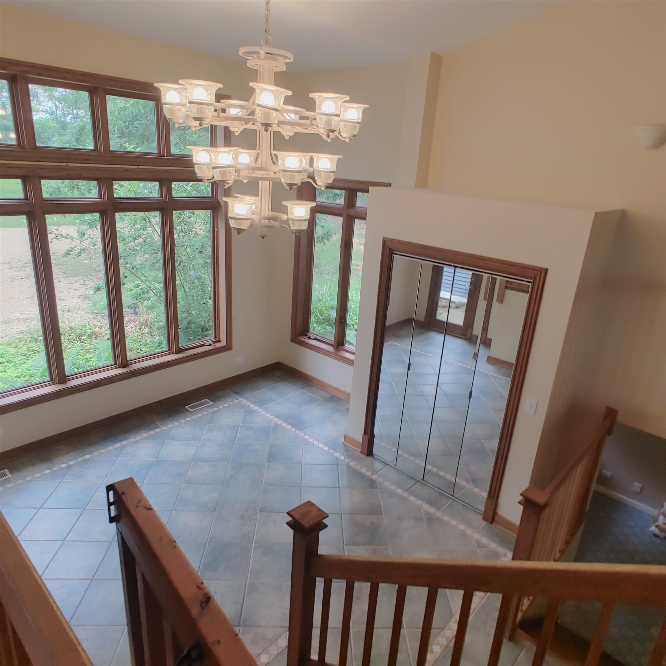 10799 Randall Road Capron, IL 61012 - Photo 21 of 68 a view of a livingroom with furniture window wooden floor and front door