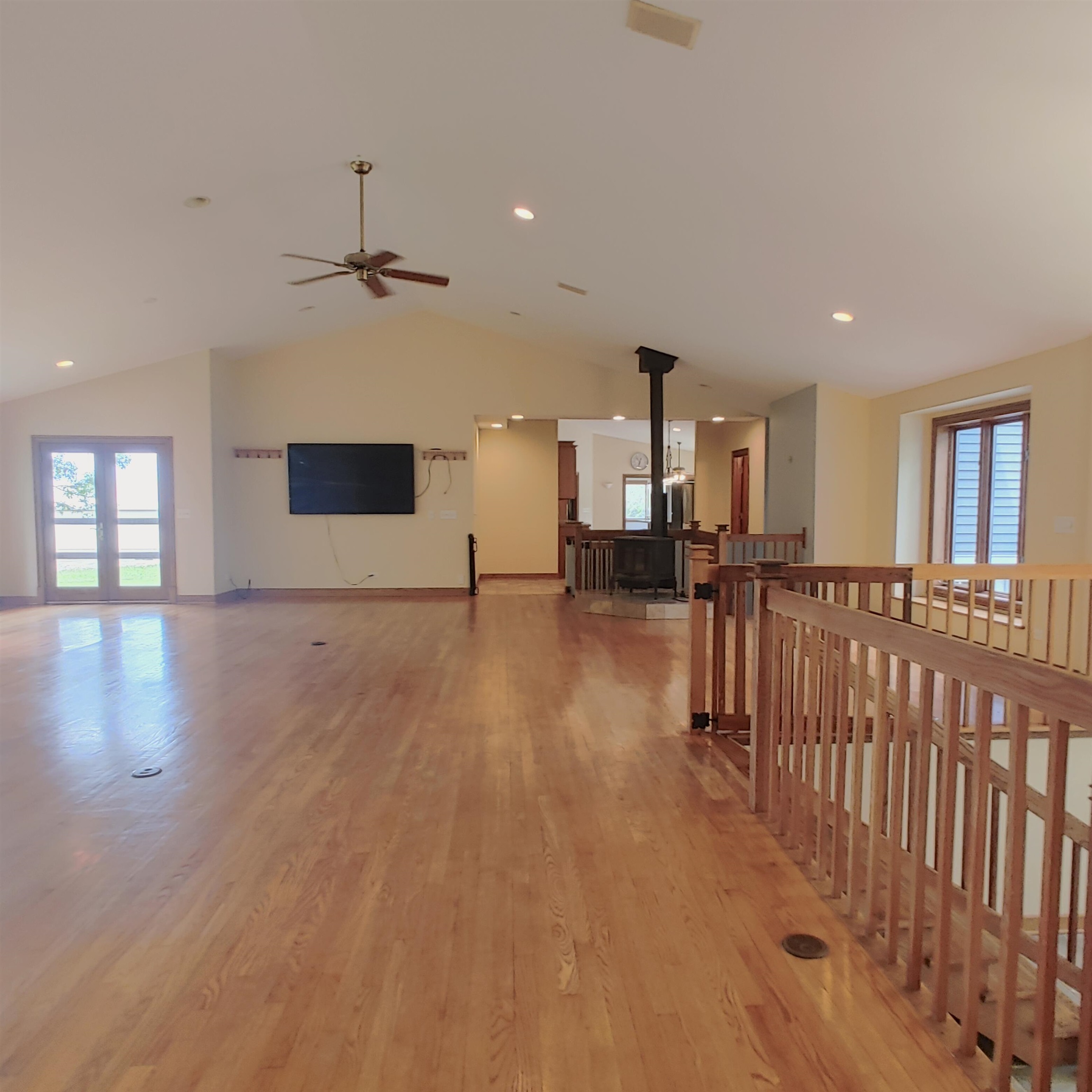 10799 Randall Road Capron, IL 61012 - Photo 23 of 68 an empty room with wooden floor and windows