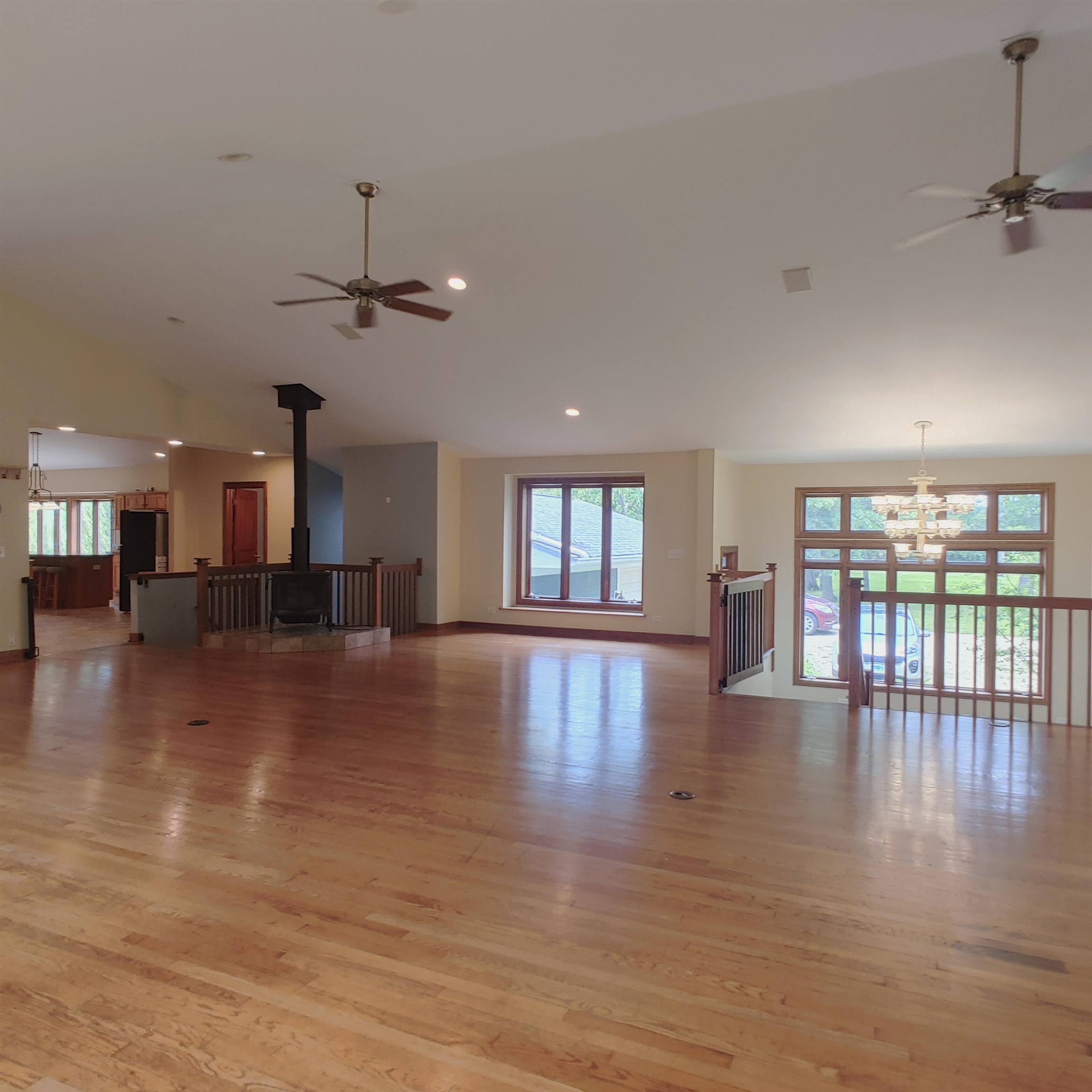 10799 Randall Road Capron, IL 61012 - Photo 24 of 68 an empty room with wooden floor and windows