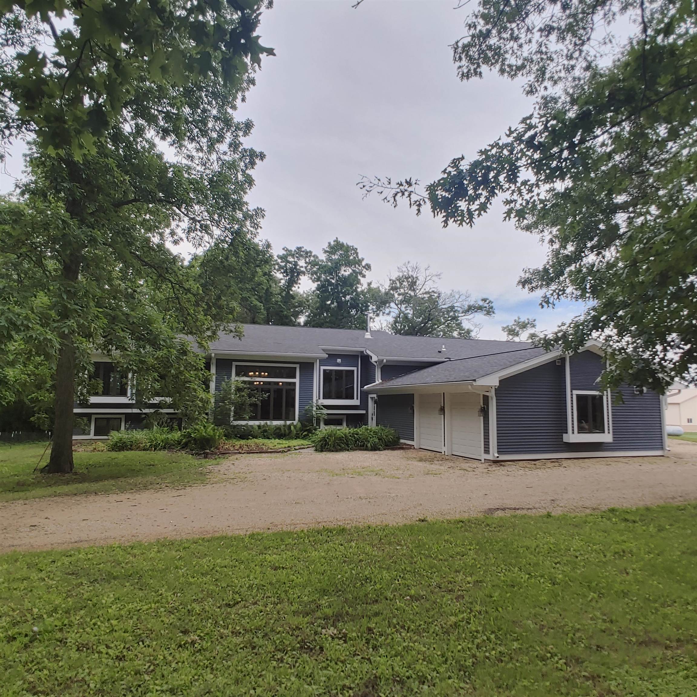 10799 Randall Road Capron, IL 61012 - Photo 3 of 68 a view of a house with a backyard