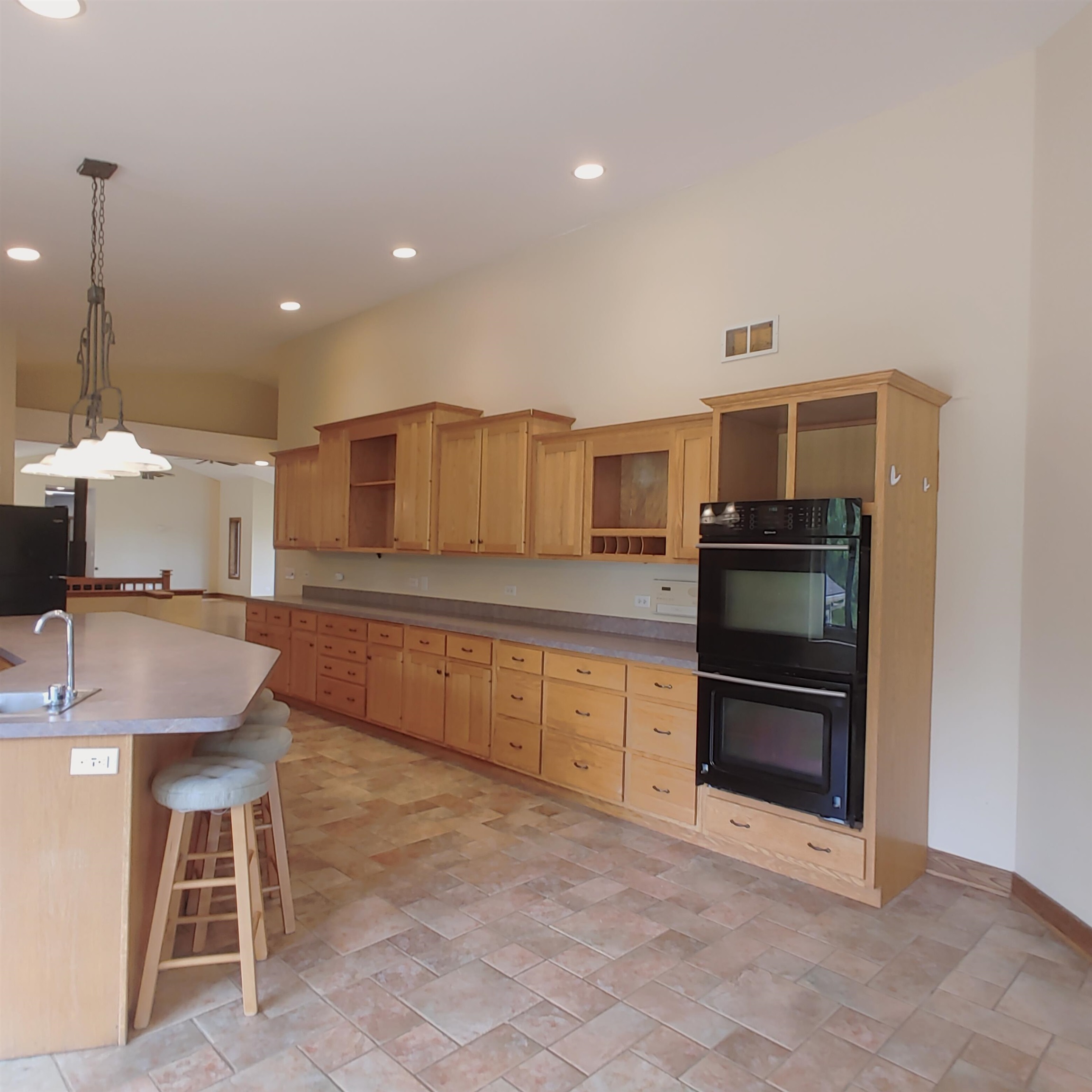 10799 Randall Road Capron, IL 61012 - Photo 32 of 68 a kitchen with stainless steel appliances granite countertop a sink and a refrigerator