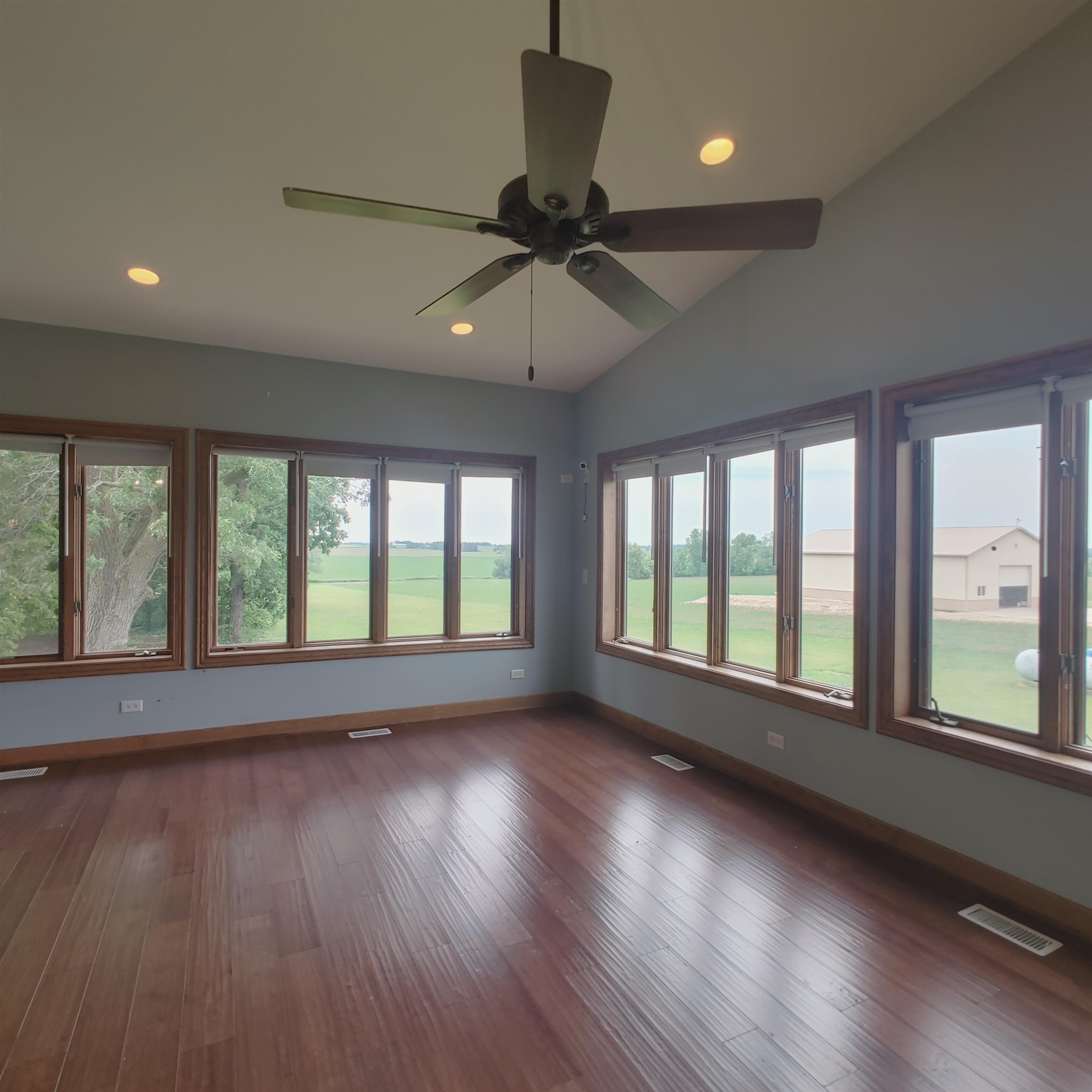 10799 Randall Road Capron, IL 61012 - Photo 39 of 68 a view of an empty room with wooden floor and a window