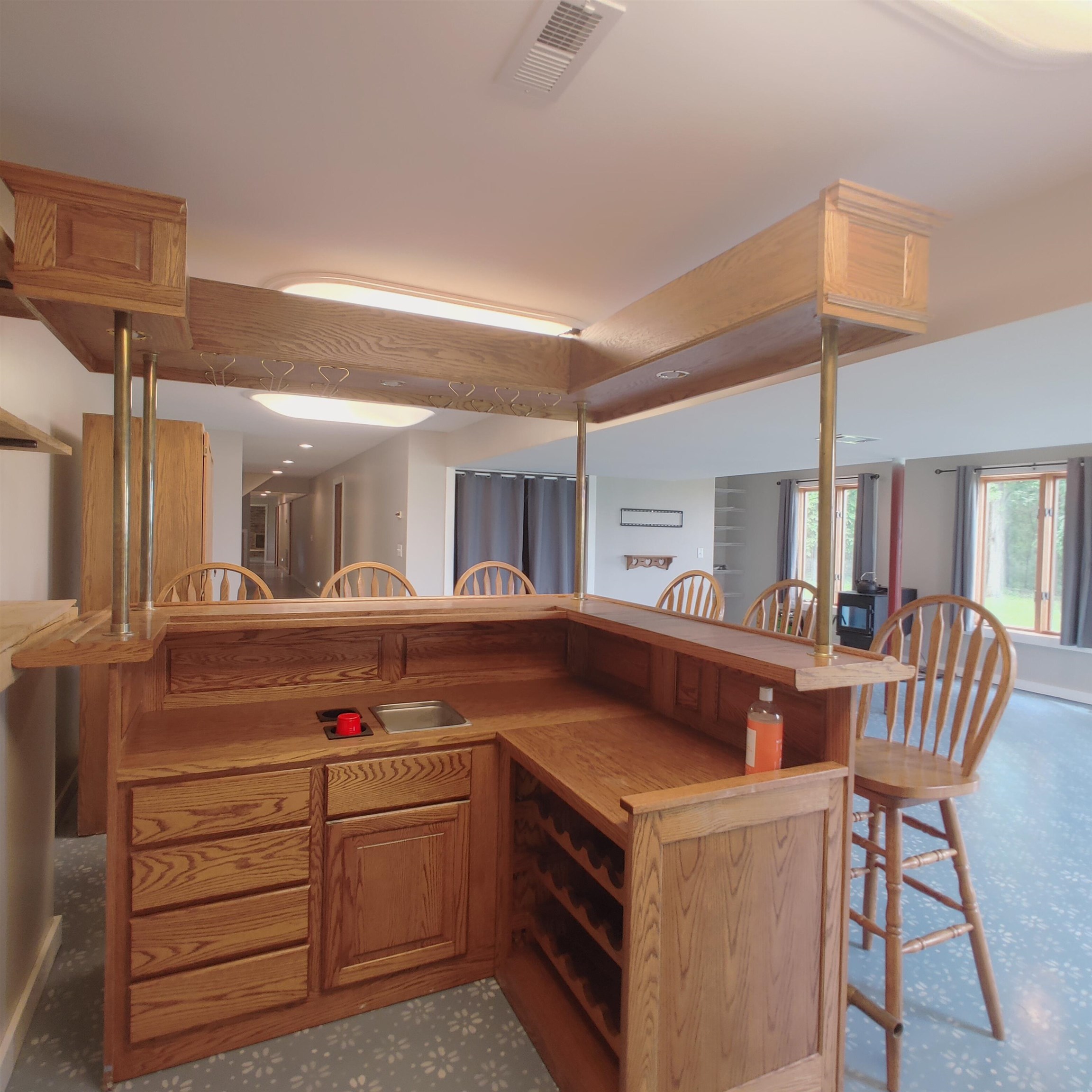 10799 Randall Road Capron, IL 61012 - Photo 56 of 68 a kitchen with a stove a sink and a refrigerator
