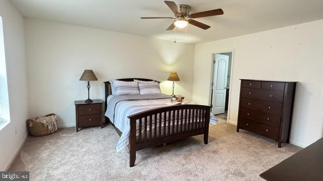 65 Chesterfield Road East Berlin, PA 17316 - Photo 17 of 32 a bedroom with a bed and a chandelier