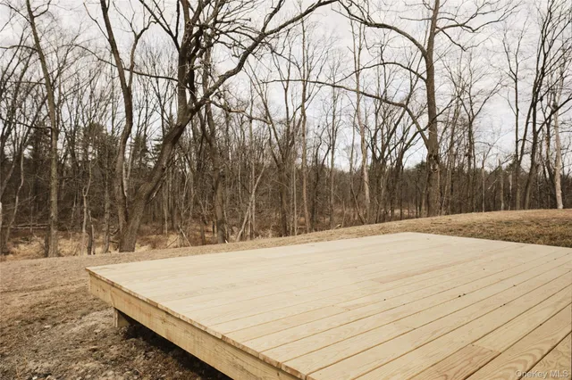 a view of a yard covered in snow