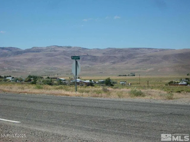 a view of a lake with a mountain