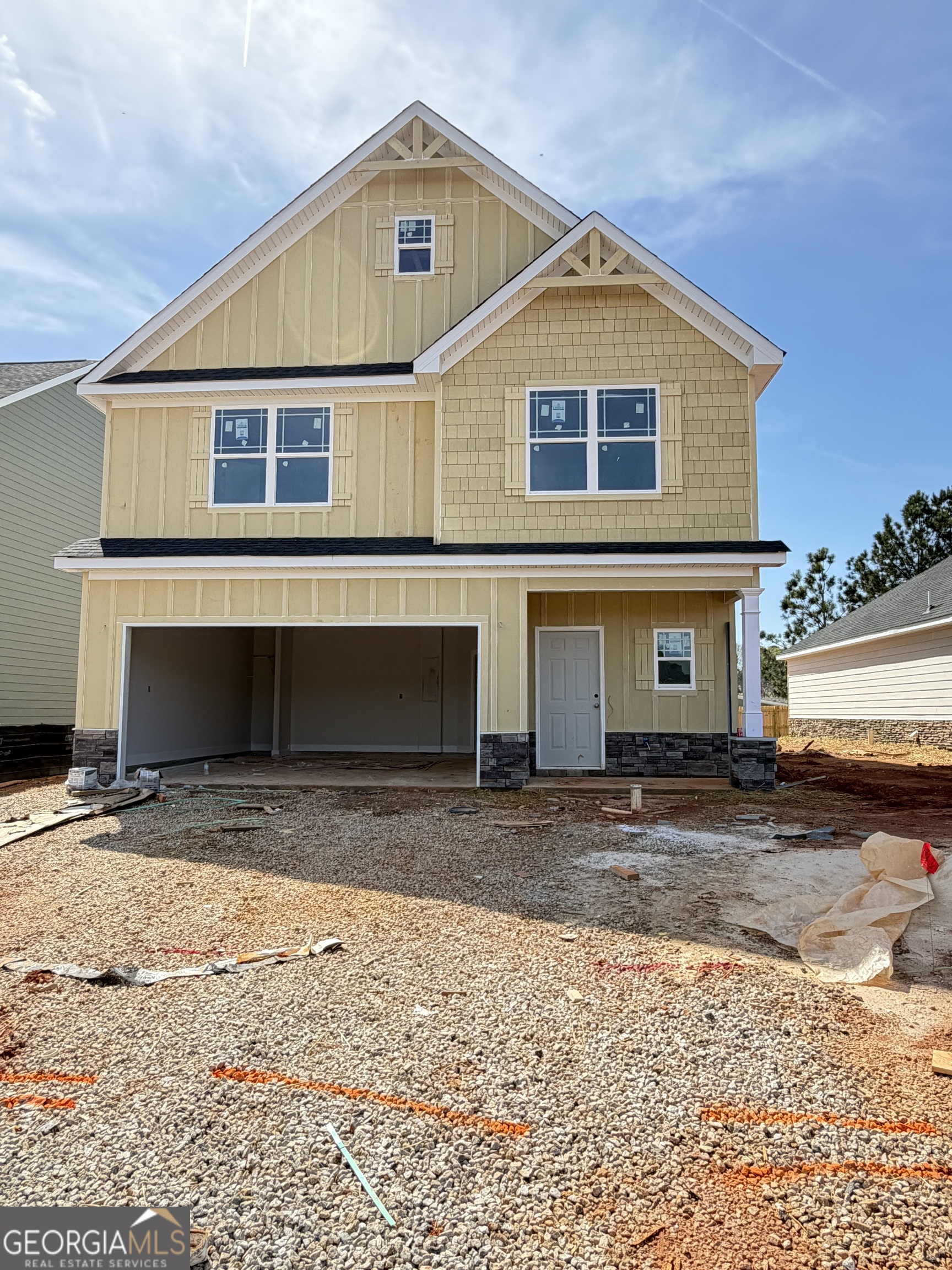 11164 Cornerstone Lane Hampton, GA 30228 - Photo 2 of 28 a front view of a house with a yard