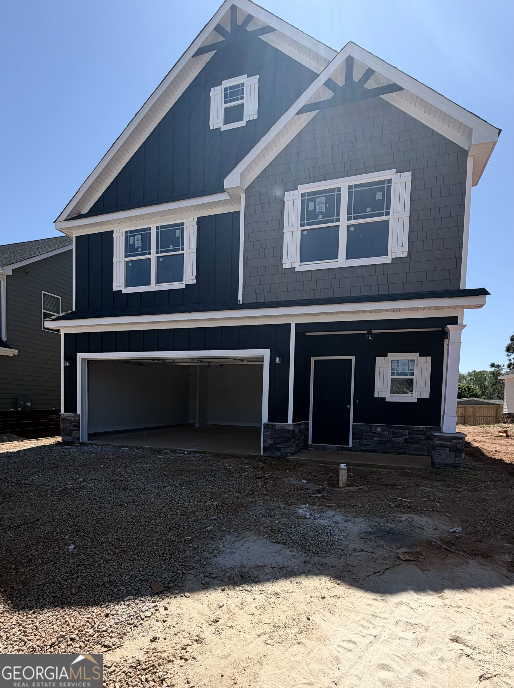11164 Cornerstone Lane Hampton, GA 30228 - Photo 6 of 28 a front view of a house with a yard
