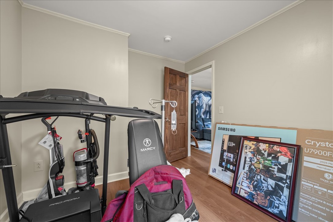 412 Sanders Street Anderson, SC 29624 - Photo 22 of 30 Hardwood flooring extends throughout this versatile room, perfect for a home gym or office.