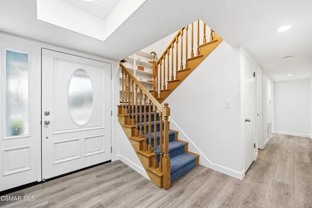a view of a swimming pool with a lounge chairs