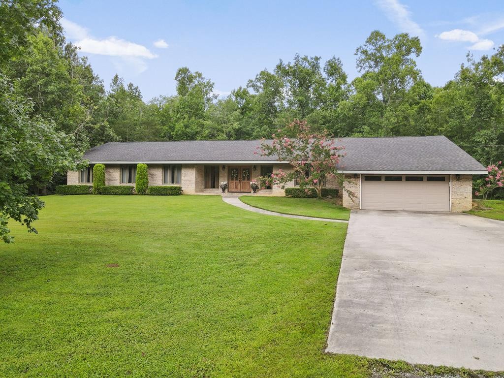5597 South No Pone Valley Road Decatur, TN 37322 - Photo 1 of 44 a view of a house with a yard