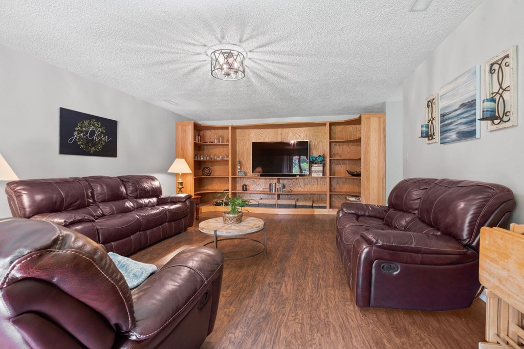 5597 South No Pone Valley Road Decatur, TN 37322 - Photo 17 of 44 a living room with furniture and a flat screen tv