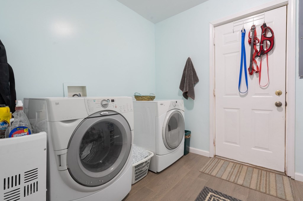 5597 South No Pone Valley Road Decatur, TN 37322 - Photo 24 of 44 a view of storage and utility room with washer and dryer