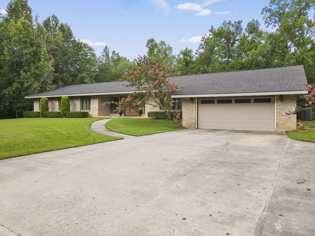 5597 South No Pone Valley Road Decatur, TN 37322 - Photo 44 of 44 a house view with a garden space