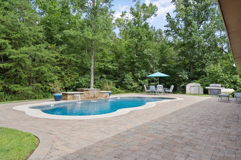 5597 South No Pone Valley Road Decatur, TN 37322 - Photo 6 of 44 a view of a swimming pool with a yard