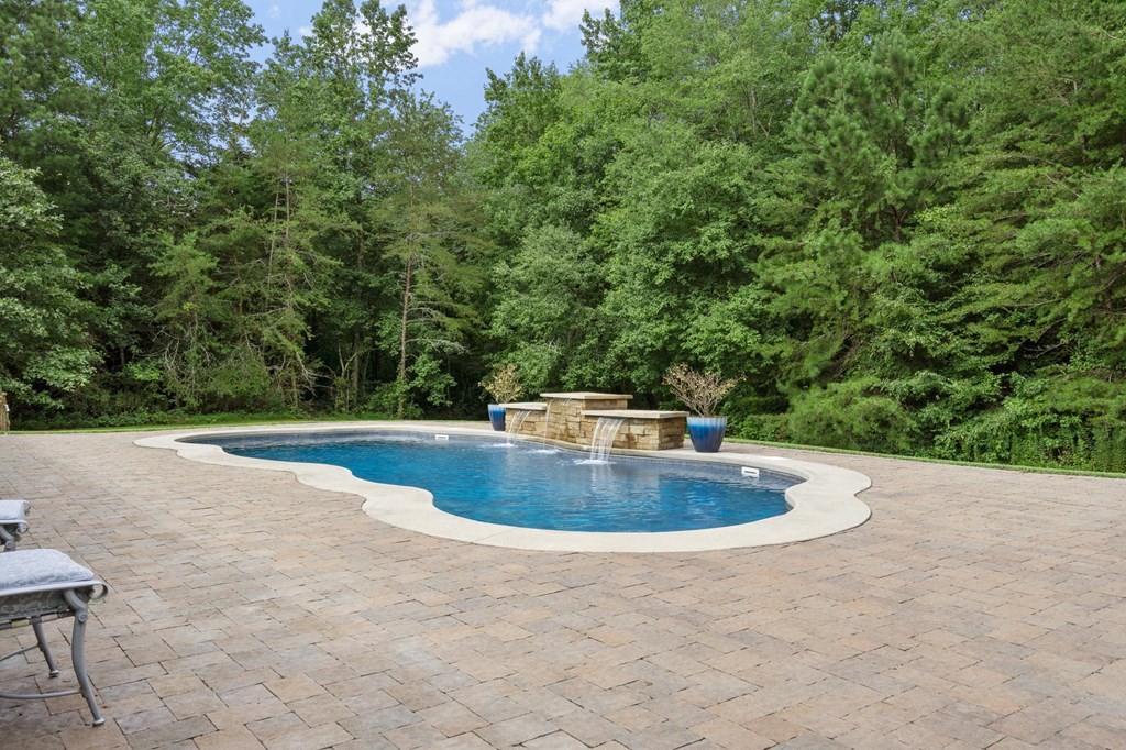 5597 South No Pone Valley Road Decatur, TN 37322 - Photo 7 of 44 a view of a swimming pool with a yard