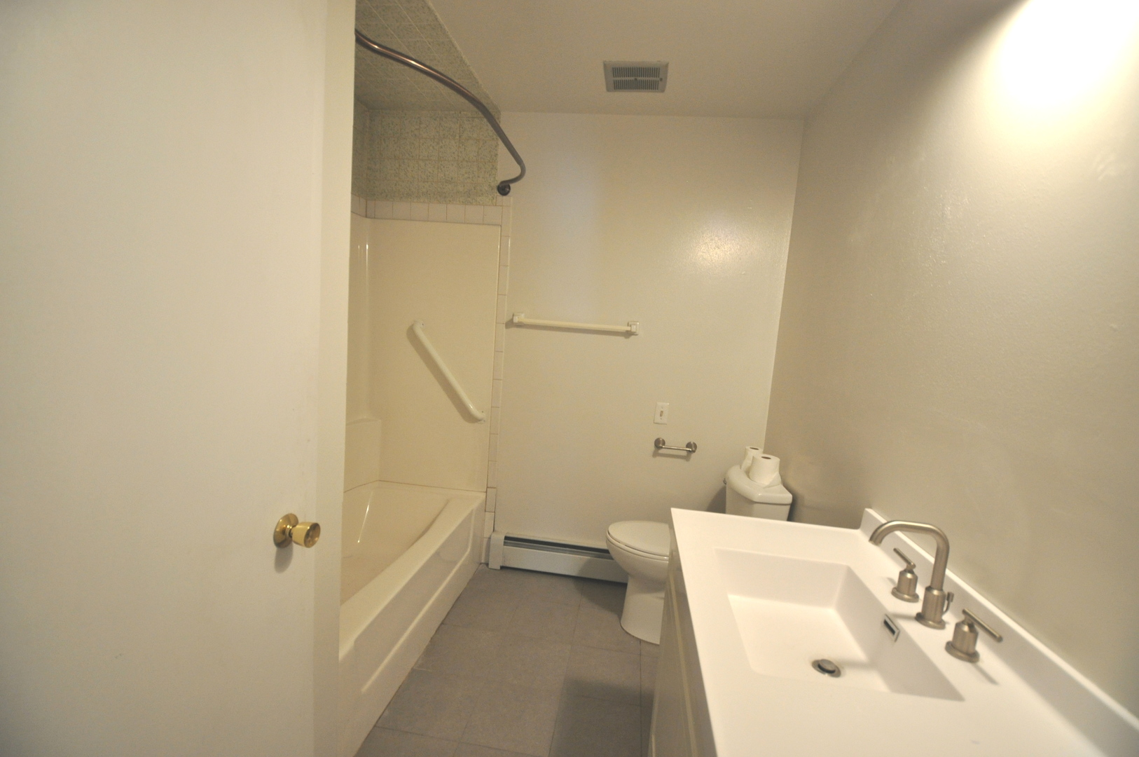 24111 64th Place Paddock Lake, WI 53168 - Photo 9 of 11 a bathroom with a sink and shower