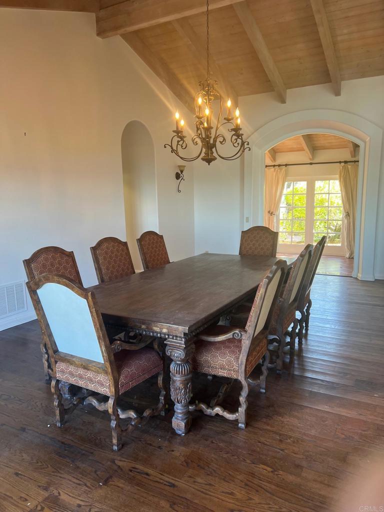 9450 La Jolla Farms Road La Jolla, CA 92037 - Photo 22 of 29 a view of a dining room with furniture and wooden floor
