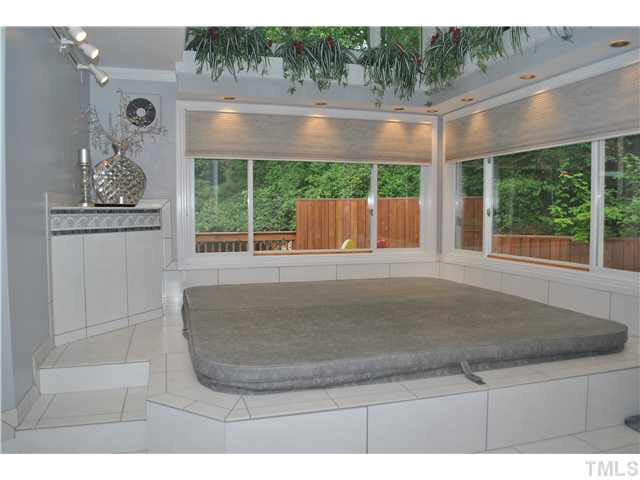 3601 Canter Lane Raleigh, NC 27604 - Photo 17 of 25 Relax in Your Indoor Hot Tub Overlooking Large Deck and Wooded Backyard!