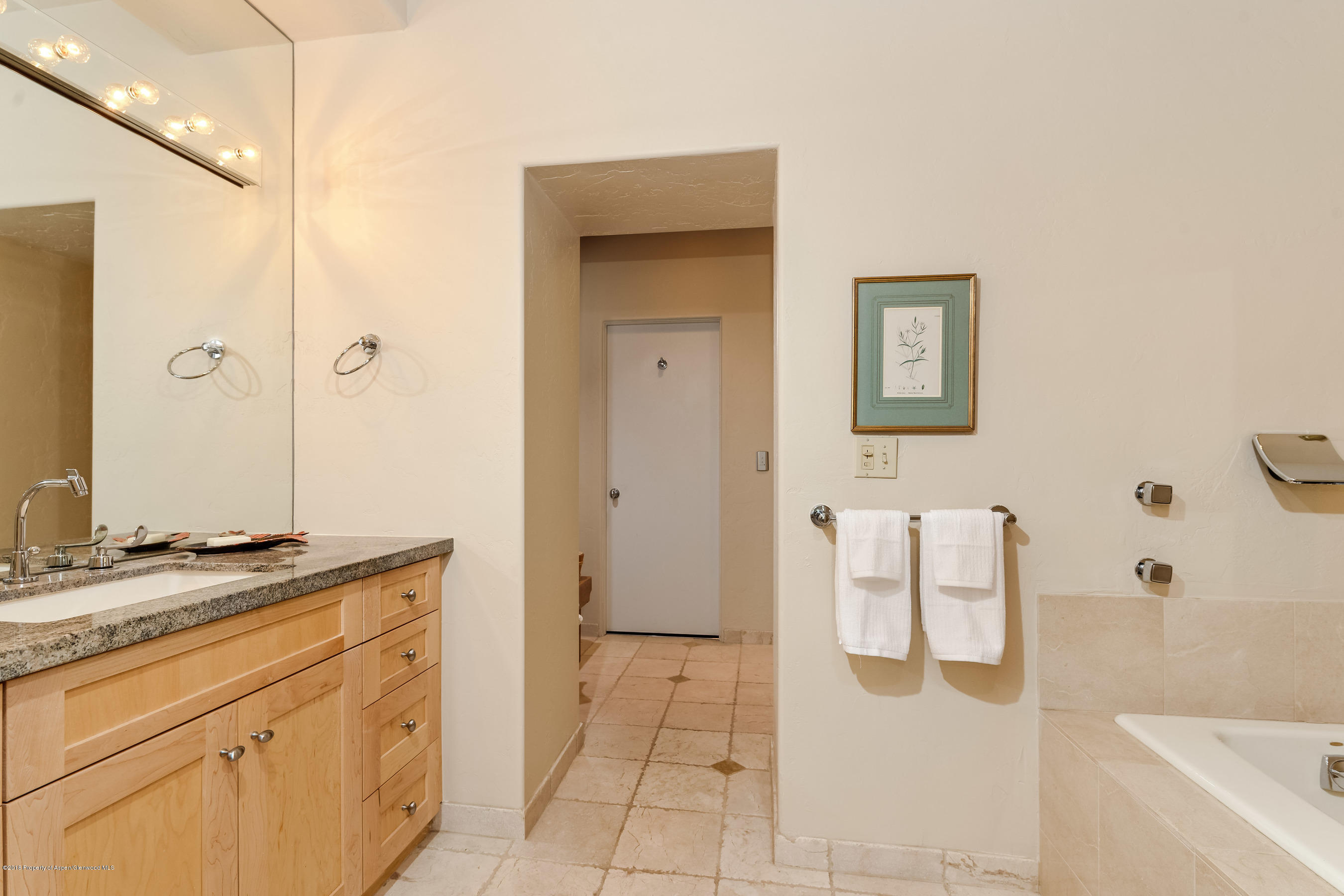 404 Wild Spring Lane Basalt, CO 81621 - Photo 12 of 25 a bathroom with a sink and a mirror