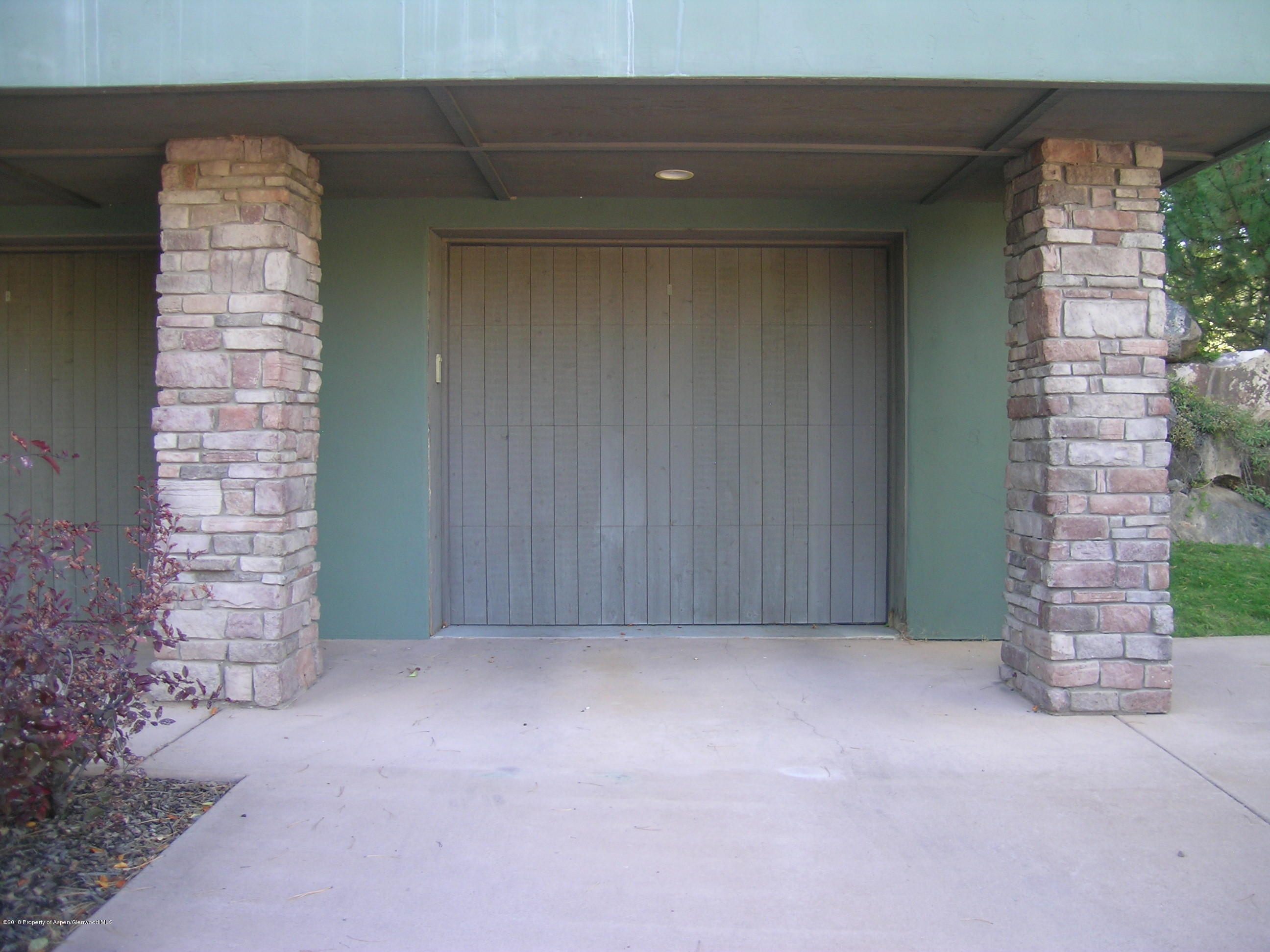 404 Wild Spring Lane Basalt, CO 81621 - Photo 22 of 25 a view of an empty room with a fireplace