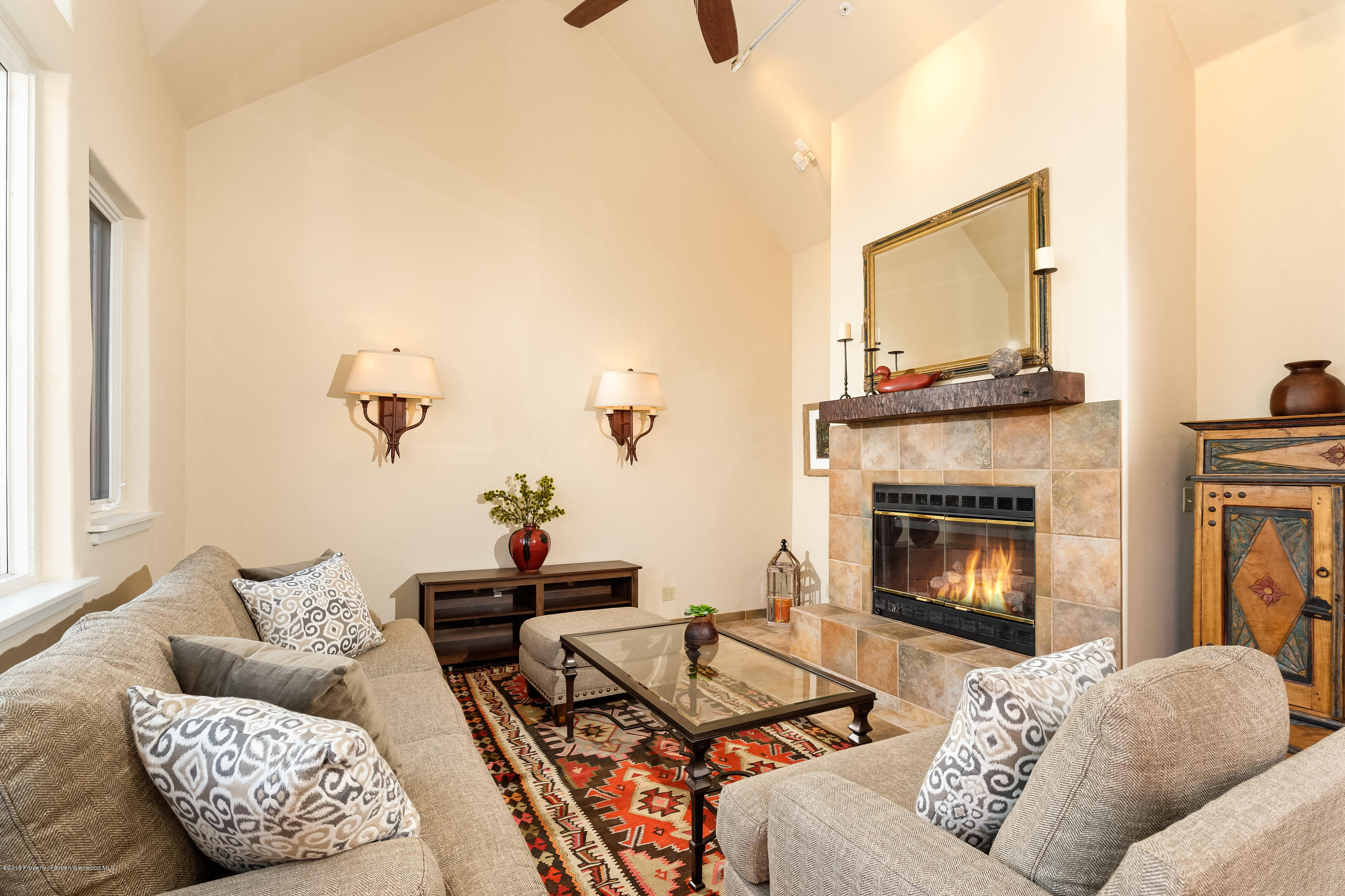 404 Wild Spring Lane Basalt, CO 81621 - Photo 7 of 25 a living room with furniture and a fireplace
