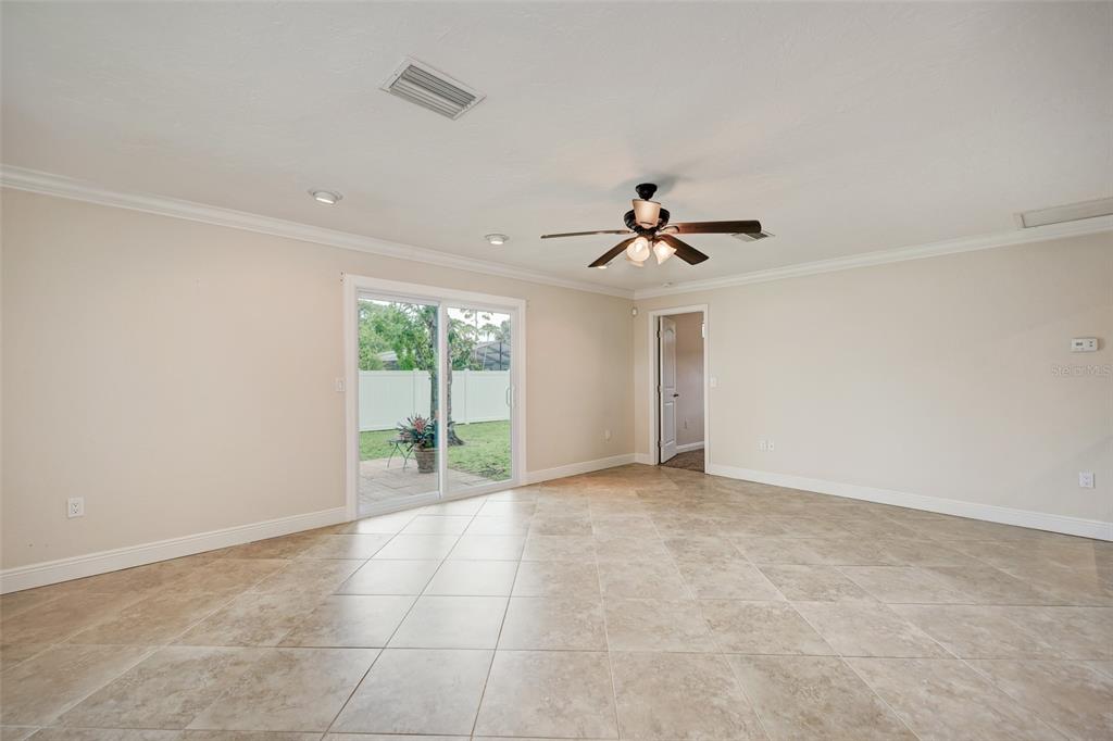 1330 Georgetowne Circle Sarasota, FL 34232 - Photo 21 of 46 a view of an empty room with a window