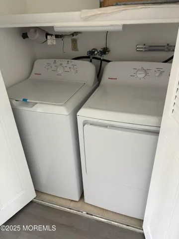 a utility room with a washer and dryer