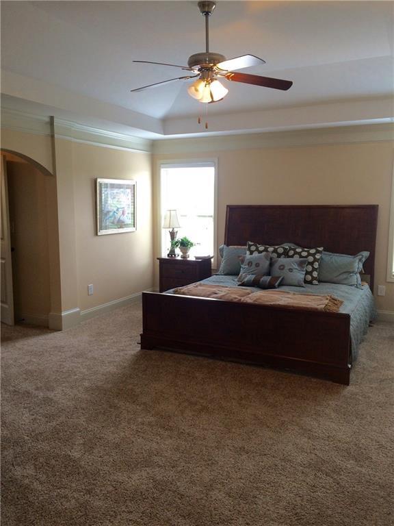 718 Channel Lane Lawrenceville, GA 30046 - Photo 14 of 16 a bed room with furniture and a window