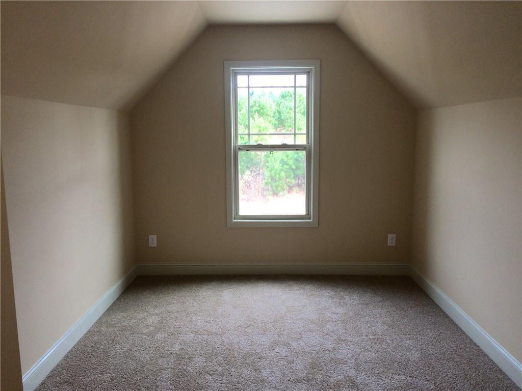 718 Channel Lane Lawrenceville, GA 30046 - Photo 15 of 16 an empty room with a window