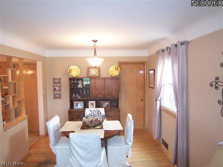 10212 Biddulph Road Cleveland, OH 44144 - Photo 10 of 20 Dining room & guest closet. Note the hardwood floor.