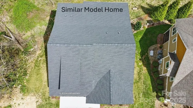 a front view of a building with garden