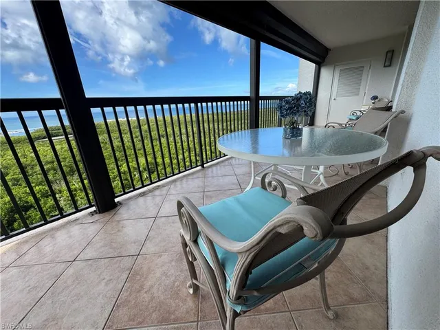 a outdoor dining space with furniture