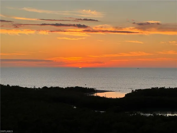 a view of lake and mountain