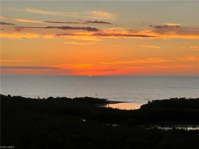 a view of lake and mountain