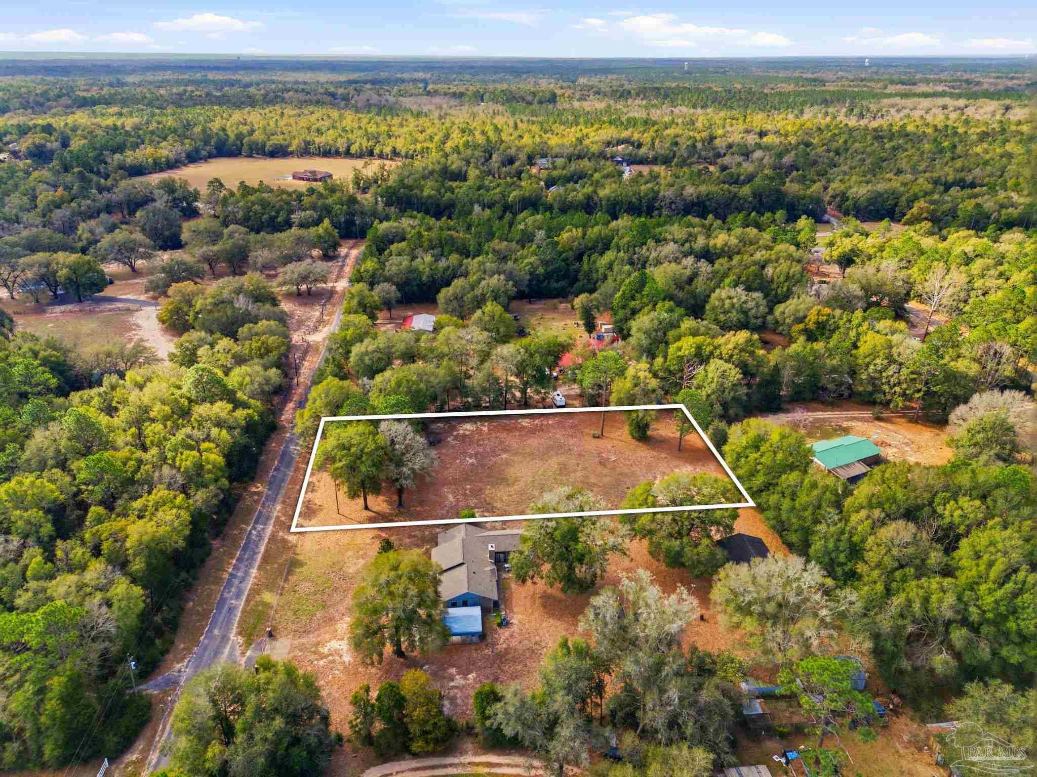 0 Howard Lane Milton, FL 32570 - Photo 5 of 9 a view of a city
