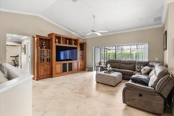 a living room with furniture and a window