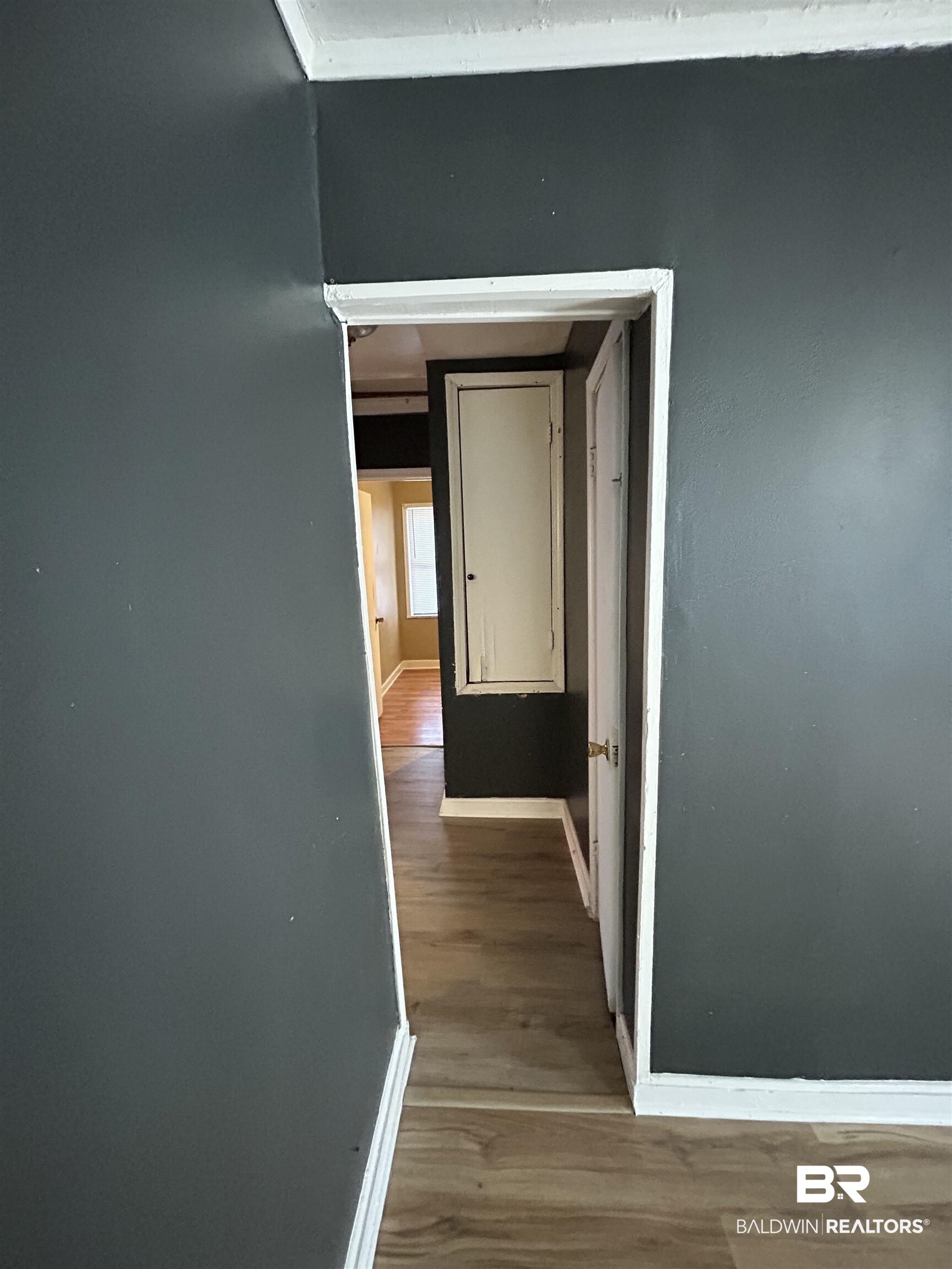 2119 Hoppin Street Mobile, AL 36605 - Photo 16 of 23 Hallway with hardwood / wood-style floors