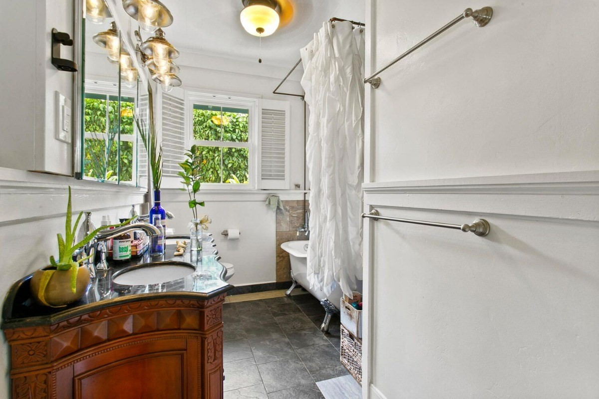 1054 Kealoha Road, Unit 2 Kapaa, HI 96746 - Photo 12 of 13 a bathroom with a sink and a window