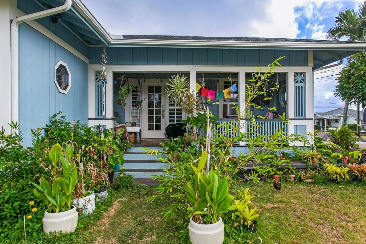 1054 Kealoha Road, Unit 2 Kapaa, HI 96746 - Photo 9 of 13 a front view of a house with plants