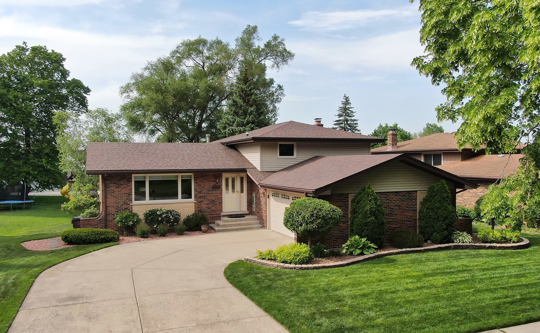 10918 3rd Street Mokena, IL 60448 - Photo 1 of 40 a front view of a house with a yard