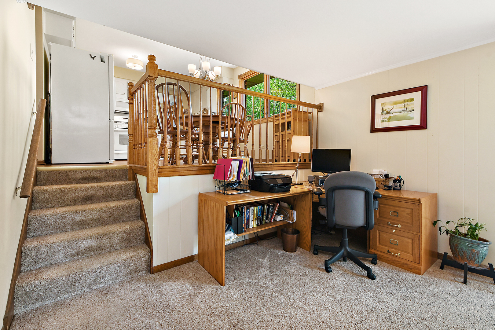 10918 3rd Street Mokena, IL 60448 - Photo 21 of 40 a view of a workspace with furniture and a window