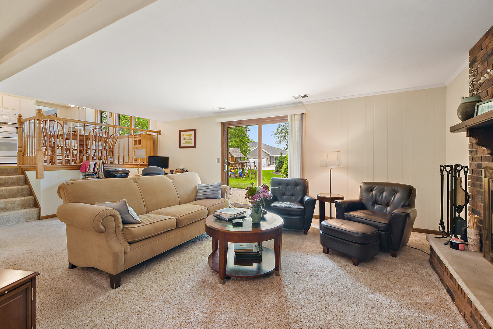 10918 3rd Street Mokena, IL 60448 - Photo 23 of 40 a living room with furniture potted plant and a large window